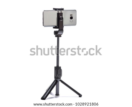 smart phone and tripod isolated on white background Royalty-Free Stock Photo #1028921806