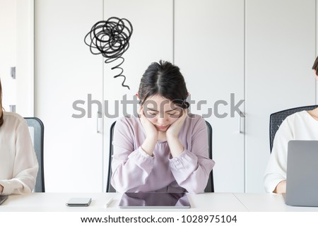 Frustrated young asian woman.