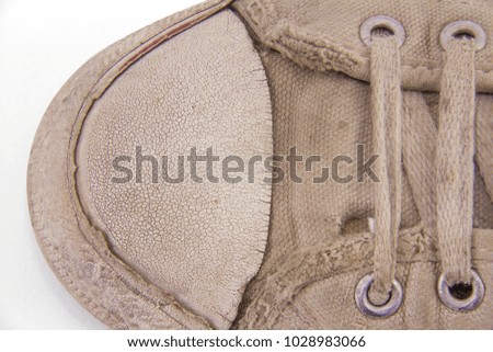 White sneakers dirty isolated on white background, Footwear for outdoor activities, clipping path done using pen tool.
