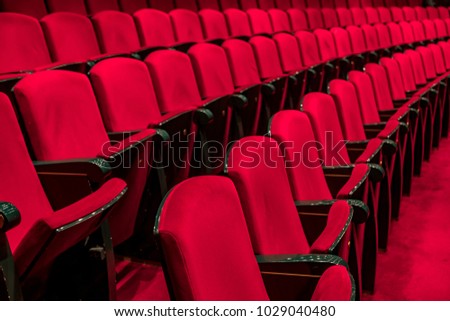 Red seats in a empty theater and opera Royalty-Free Stock Photo #1029040480