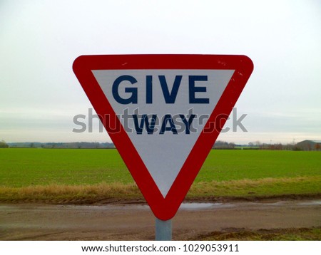Give way to traffic on major road sign