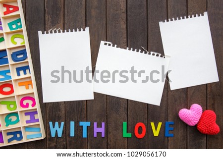 Abstract empty note with Red and Pink Heart Knitting on wood background. valentine greeting card copy space for add text message. With Love.