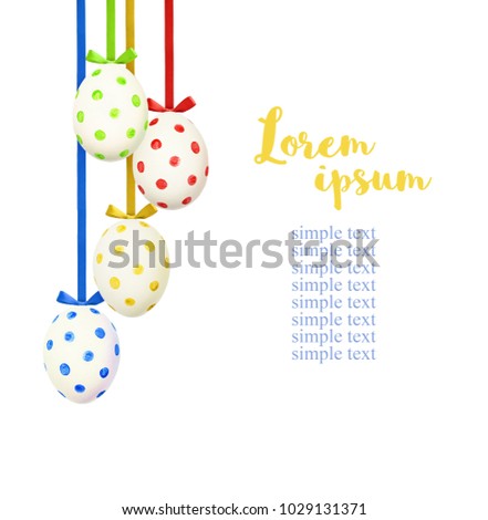 Colorful easter eggs hanging on silk ribbons with bows isolated on white background. Holiday arrangement.