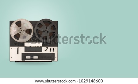 Tape cassette recorder and player with on color background. retro technology. flat lay, top view hero header. vintage color styles. Royalty-Free Stock Photo #1029148600