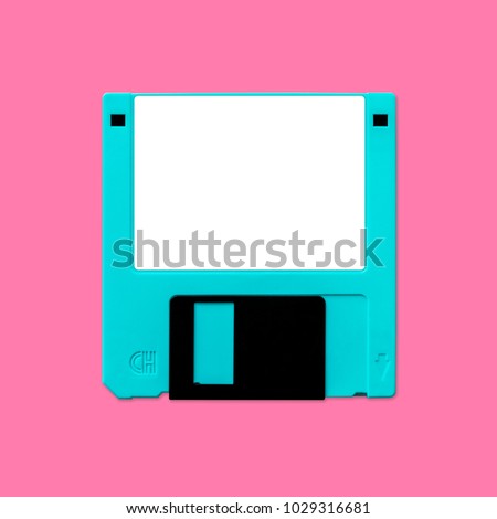 Floppy disk 3.5" inch nostalgia, isolated and presented in punchy pastel colors, for creative design cover, CD, poster, book, printing, gift card, flyer, magazine, web & print Royalty-Free Stock Photo #1029316681