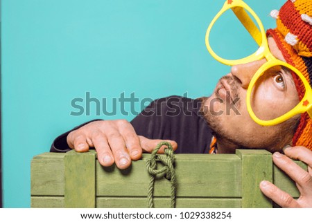 Funny picture of a man. With hat and glasses