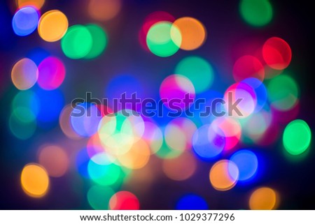 colorful of bokeh at nightlight for background. subject is blurred and low key.