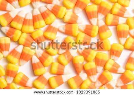 Candy corn halloween candies shot close up on a white background