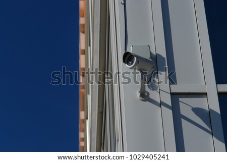 CCTV security camera on the wall outside