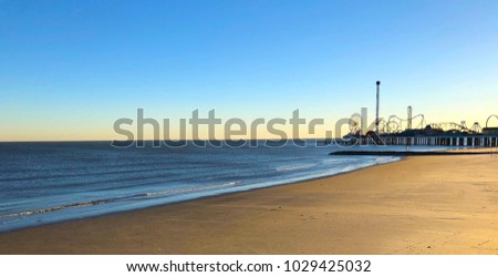 Galveston beach at sunset  Royalty-Free Stock Photo #1029425032