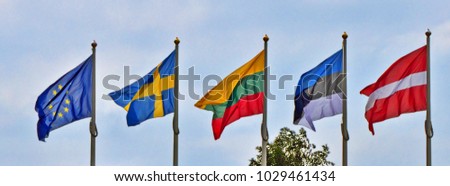 The national flags of the Baltic countries: Lithuania, Sweden, Estonia, Latvia and the flag of the European Union. National flags - symbols of independence and freedom