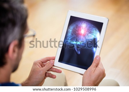 Digital composite of Man using tablet for science
