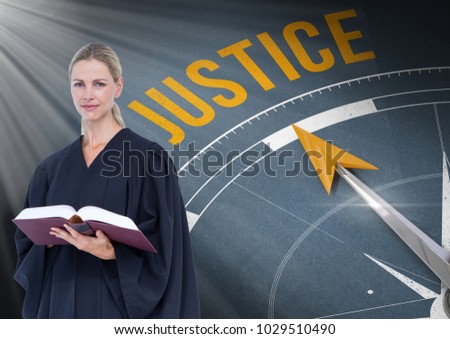 Digital composite of Judge holding book in front of justice text and compass