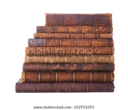 Stack of nine antique books, isolated white background Royalty-Free Stock Photo #102951095