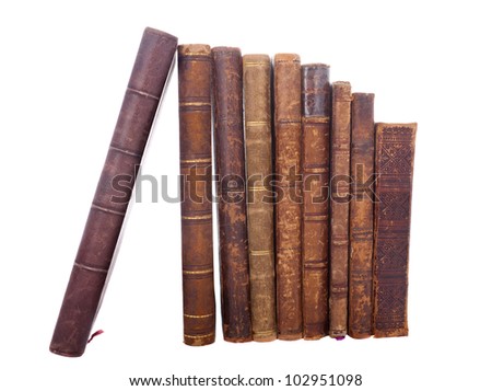 Stack of nine antique books, isolated white background Royalty-Free Stock Photo #102951098