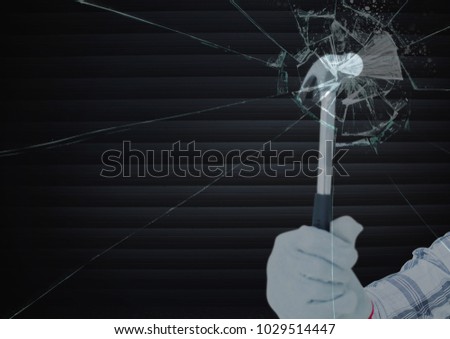 Digital composite of Hand with hammer breaking the screen in front of blind