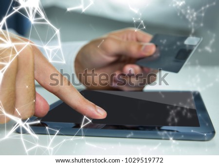 Digital composite of Hands with tablet and credit card and white network overlay