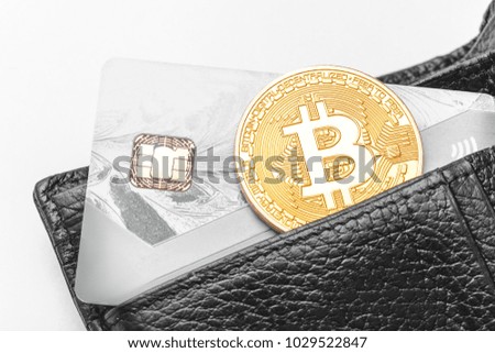 Bitcoin on a credit bank card, concept of trendy modern electronic money and business