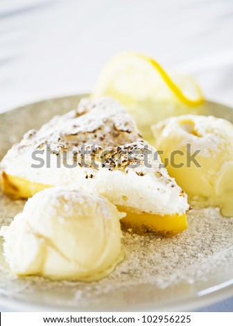 Lemon Pie with ice cream on plate
