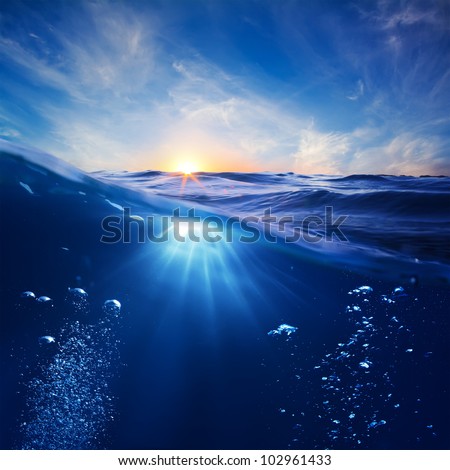 design template with underwater part and sunset skylight splitted by waterline Royalty-Free Stock Photo #102961433