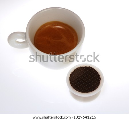 isolated coffee espresso cup: cup of caffè in a typical classic Italian espresso cup isolatet on a white background without people
