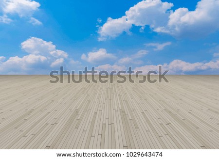 Asphalt pavements and square floor tiles under the blue sky and 