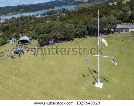 Waitangi Day, Treaty Grounds Flag Pole Showing New Zealand And Maori Shipping Flags. Aerial Point Of View 