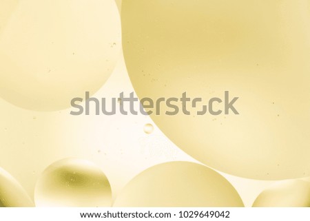 mixing water and oil, beautiful color abstract background based on circles and ovals, macro abstraction