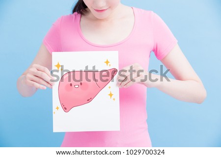 woman take health liver billboard on the blue background