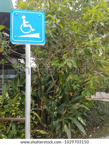 Disabled sign of wheelchair ramp.