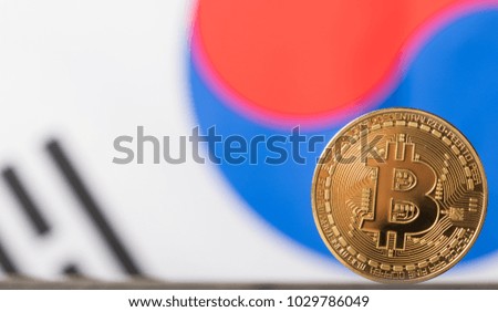 Bitcoin against South Korean flag background
