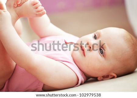 Picture of a baby lying in bed
