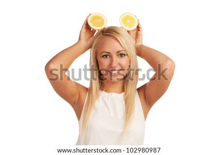 Girl playing with lemon
