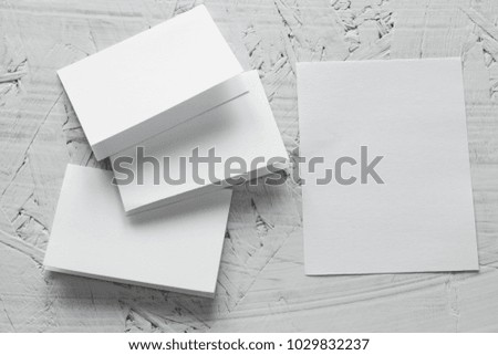 Blank mockup paper. brochure magazine on white wood, changeable background.