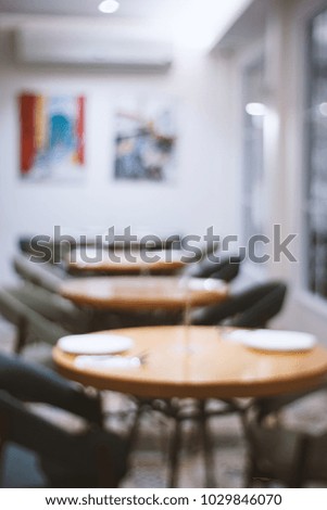 abstract blur and defocused modern restaurant interior for background, old film look effect