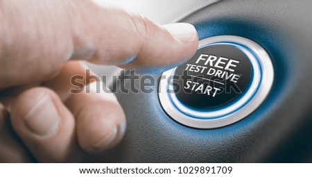 Man pushing a free test drive button. Composite image between a finger photography and a 3D background. Royalty-Free Stock Photo #1029891709