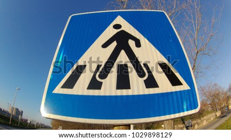 Blue pedestrian walkway sign