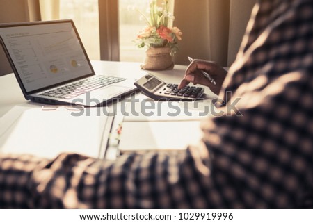 Businessman thinking plan all about money return on investment on chair in office with notebook
