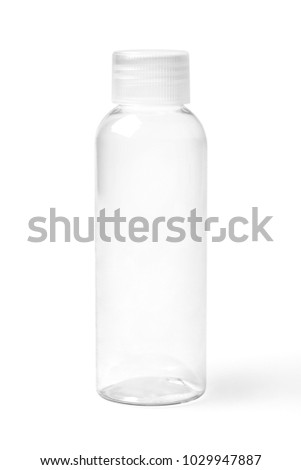 Closed empty colorless transparent plastic bottle for cosmetic products. Royalty-Free Stock Photo #1029947887
