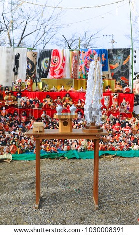 A lot of Japanese dolls in kimono displaying on tiered stand during the Ku yo Otakiage Ceremony (A bonfire ceremony of farewell memorial service) at the Japan Shinto shrine Wide angle Overall image 5