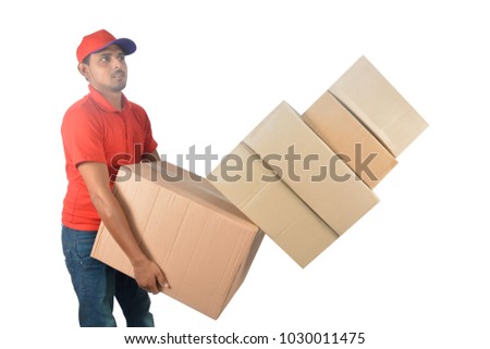 Delivery man holding carton boxes in uniform isolated on white background