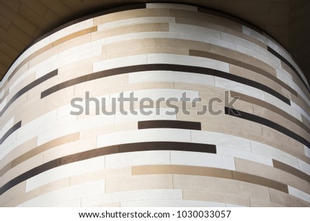 abstract elegance seamless beige and brown pattern of slate stone block wall texture for background and wallpaper, big and wide modern stone wall