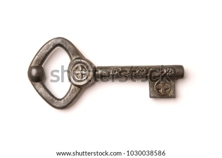 Vintage old key isolated on white background