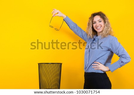 Woman throw away her glasses Royalty-Free Stock Photo #1030071754