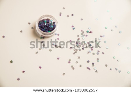 Purple, pink and blue glitter stars can