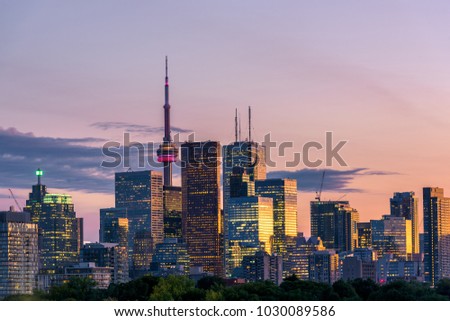 Sunset over modern buildings in Toronto city