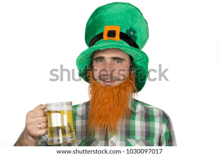 Man in Leprechaun hat and red beard isolated on white background. Saint Patrick Day concept