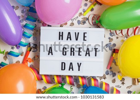 Party celebration background with have a great day message on a lightbox
