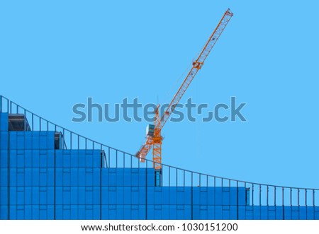 Construction crane and skyscraper