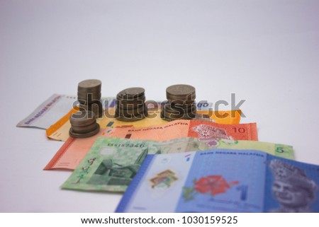 Closeup shot of Money and Coins in white background